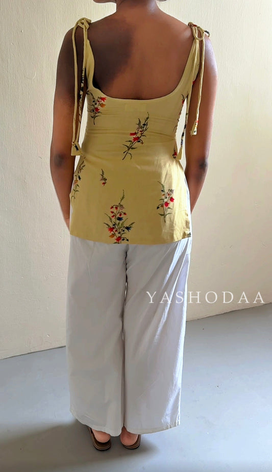Mridu in pastel yellow